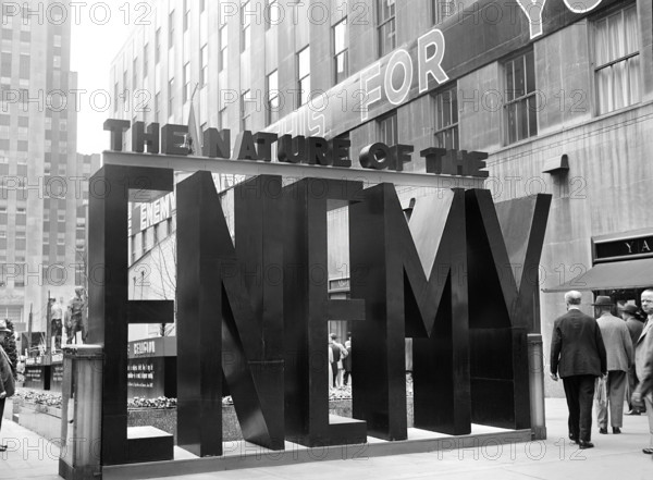 Entrance to the 'Nature of the Enemy' exhibition, sponsored by U.S. Office Of War Information, Rockefeller Plaza, New York City, New York, USA, Arthur S. Siegel, U.S. Office of War Information, May 1943