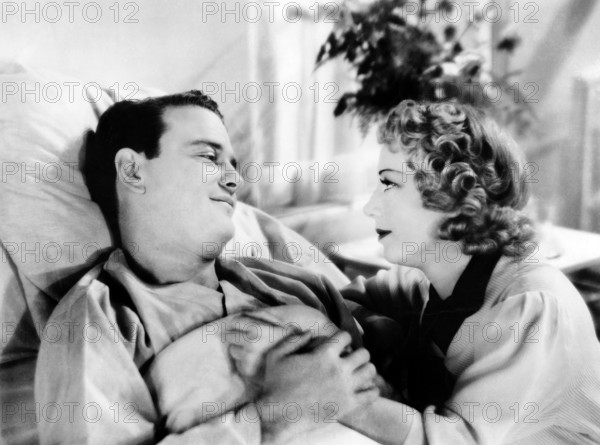 Lew Ayres, Isabel Jewell, on-set of the film, "The Leathernecks Have Landed", Republic Pictures, 1936