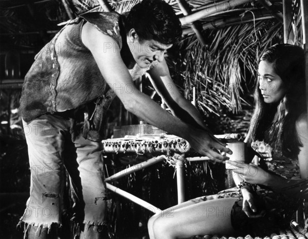 Dick Van Dyke, Nancy Kwan, on-set of the Walt Disney film, "Lt. Robin Crusoe, U.S.N.", Buena Vista, 1966