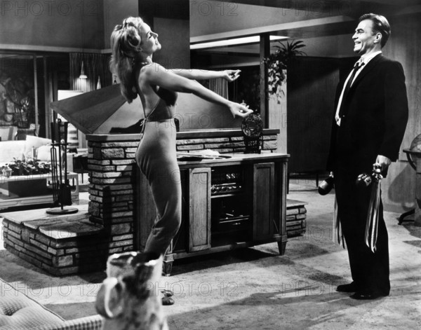 Julie Newmar, James Mason, on-set of the film, "The Marriage-Go-Round", 20th Century-Fox, 1961