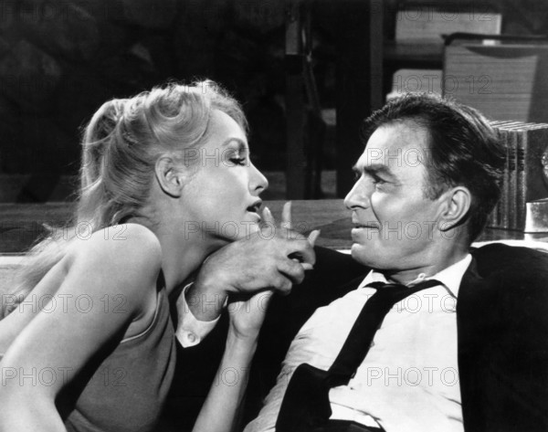Julie Newmar, James Mason, on-set of the film, "The Marriage-Go-Round", 20th Century-Fox, 1961