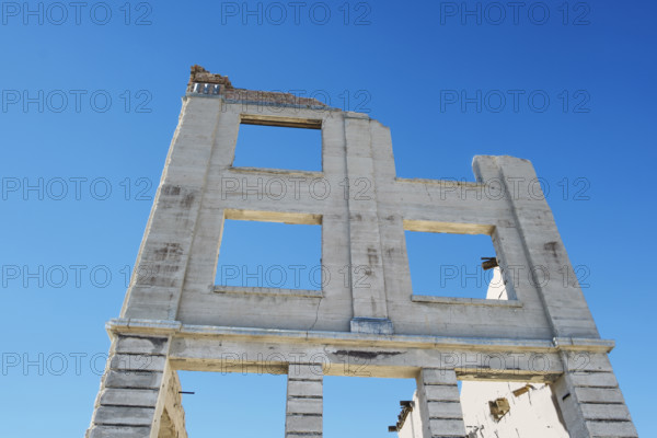 Low angle view of facade of the John S. Cook and Co. Bank in mining ghost town, Rhyolite, Nevada, USA