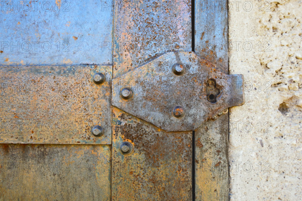 Close-up detail of rusted metal jail door