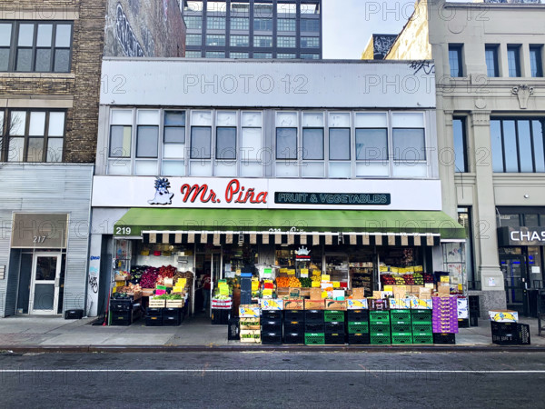 Fruit and vegetable grocery store, building exterior and street scene, Williamsburg, Brooklyn, New York, USA