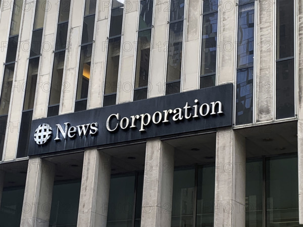 News Corporation, detail of company logo on building exterior, 1211 Avenue of the Americas, New Yor City, New York, USA