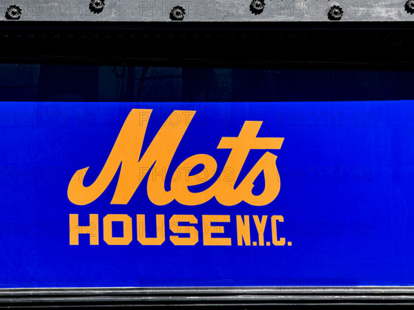 Mets House NYC, pop-up store and activities space, building exterior detail of blue and orange store sign, New York City, New York, USA