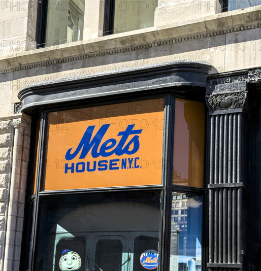 Mets House NYC, pop-up store and activities space, building exterior detail of orange and blue store sign, New York City, New York, USA
