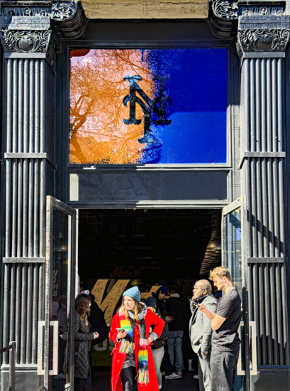 Mets House NYC, pop-up store and activities space, building exterior with group of people standing at entrance, New York City, New York, USA