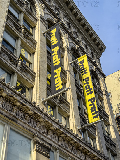 Pratt Institute, low angle view of building exterior and school banners, West 14th Street, New York City, New York, USA