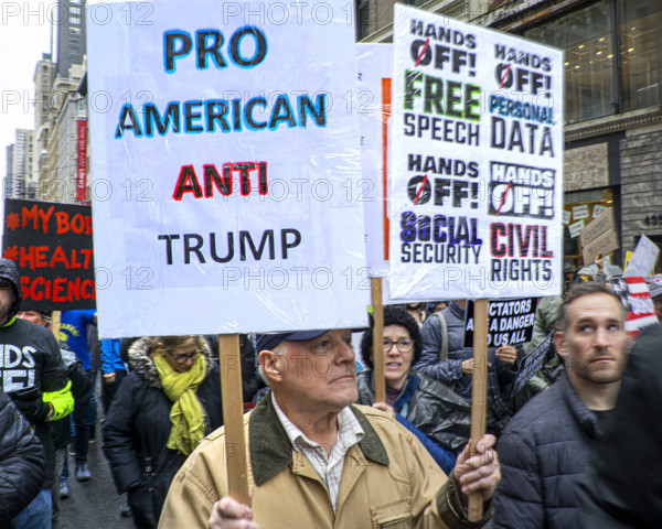 Demonstrators participating in "Hands Off" National Day of Action Protest, New York City, New York, USA
