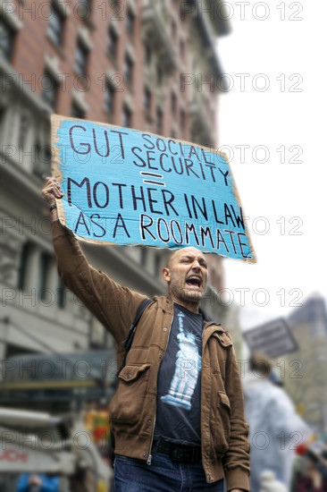 Demonstrator participating in "Hands Off" National Day of Action Protest, New York City, New York, USA