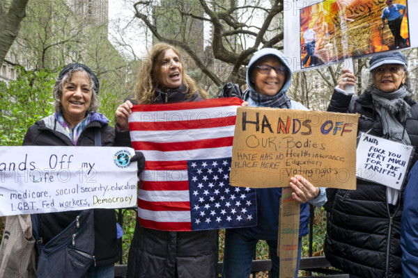 Demonstrators participating in "Hands Off" National Day of Action Protest, New York City, New York, USA