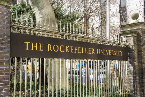 The Rockefeller University, a private biomedical research and graduate-only university, university name on wrought iron fence, New York City, New York, USA