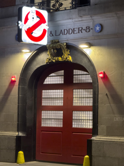 Beaux-Arts style firehouse from 1903 illuminated at night, made famous as the headquarters of the 1984 film, "Ghostbusters", New York City, New York, USA