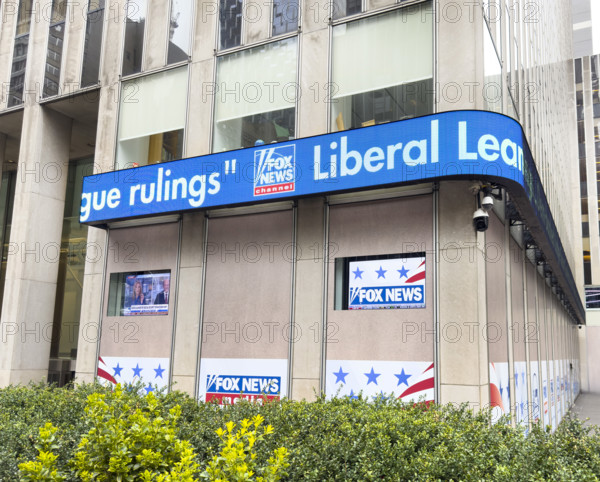 Fox News, building exterior with electronic news display, New York City, New York, USA