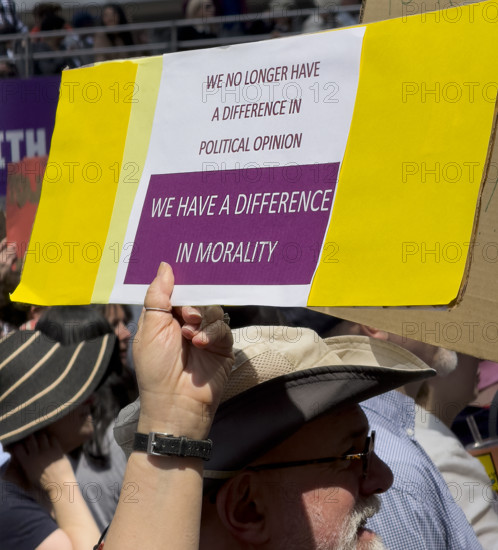 Demonstrators participating in "Our City, Our Fight: Protect Migrants, Protect the Planet" protest, New York City, New York, April 19, 2025