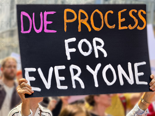 Demonstrators participating in "Our City, Our Fight: Protect Migrants, Protect the Planet" protest, New York City, New York, April 19, 2025