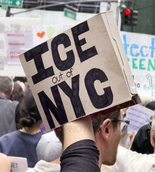 Demonstrators participating in "Our City, Our Fight: Protect Migrants, Protect the Planet" protest, New York City, New York, April 19, 2025