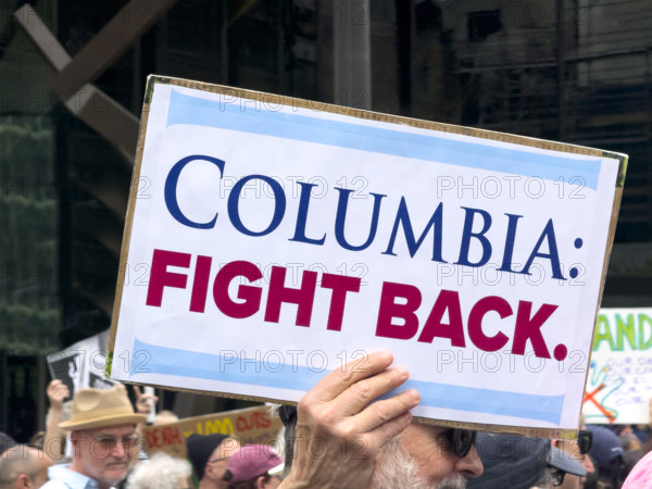 Demonstrators participating in "Our City, Our Fight: Protect Migrants, Protect the Planet" protest, New York City, New York, April 19, 2025