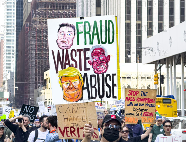 Demonstrators participating in "Our City, Our Fight: Protect Migrants, Protect the Planet" protest, New York City, New York, April 19, 2025