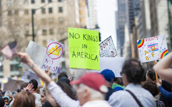 Demonstrators participating in "Our City, Our Fight: Protect Migrants, Protect the Planet" protest, New York City, New York, April 19, 2025