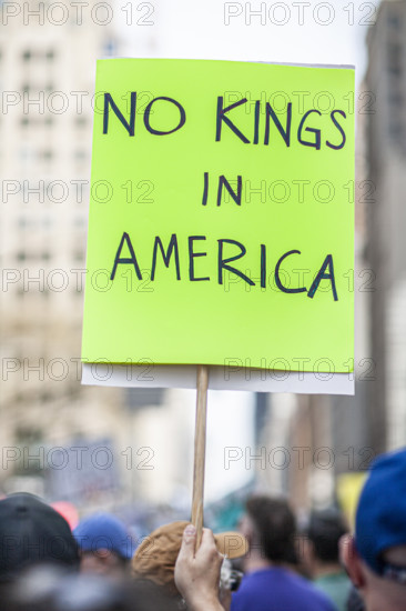 Demonstrators participating in "Our City, Our Fight: Protect Migrants, Protect the Planet" protest, New York City, New York, April 19, 2025