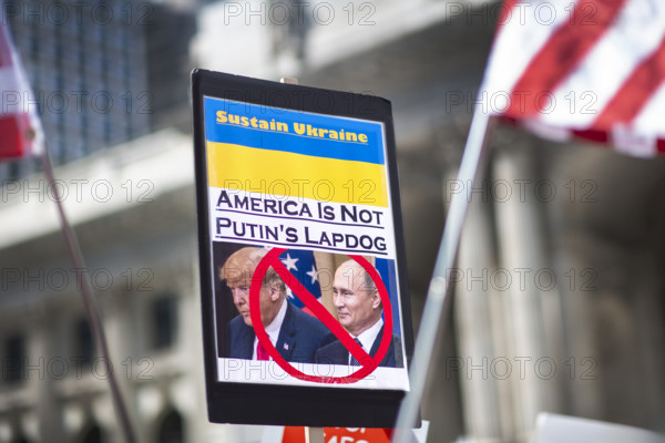 Demonstrators participating in "Our City, Our Fight: Protect Migrants, Protect the Planet" protest, New York City, New York, April 19, 2025