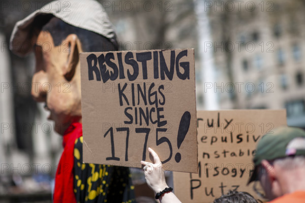 Demonstrators participating in "Our City, Our Fight: Protect Migrants, Protect the Planet" protest, New York City, New York, April 19, 2025