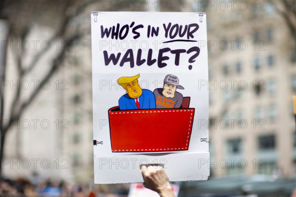 Demonstrators participating in "Our City, Our Fight: Protect Migrants, Protect the Planet" protest, New York City, New York, April 19, 2025
