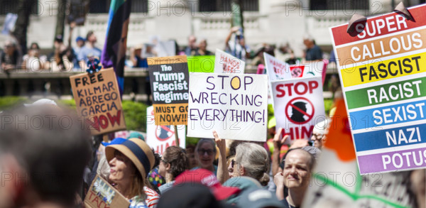 Demonstrators participating in "Our City, Our Fight: Protect Migrants, Protect the Planet" protest, New York City, New York, April 19, 2025