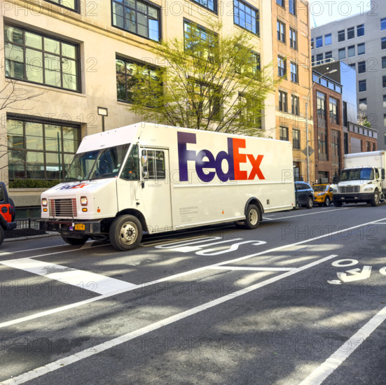 FedEx delivery truck parked on street, New York City, New York, USA