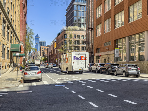 FedEx delivery truck and street scene, New York City, New York, USA