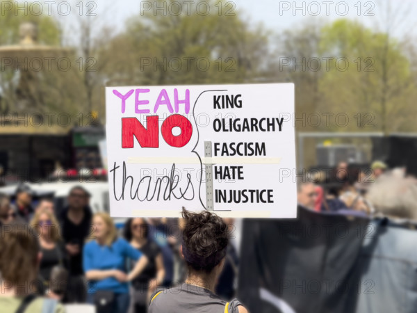 Demonstrators participating in "Our City, Our Fight: Protect Migrants, Protect the Planet" protest, New York City, New York, April 19, 2025