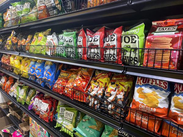 Selection of salty snacks in store