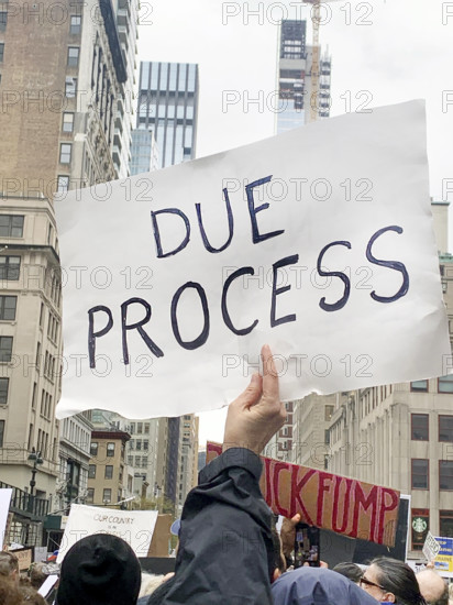 Demonstrators participating in "Hands Off" National Day of Action Protest, Fifth Avenue, New York City, New York, USA, April 5, 2025