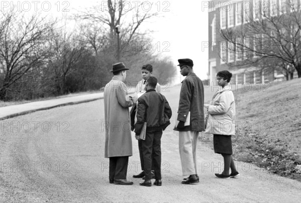 African American students with F. Brent Sandidge, General Supervisor of Instruction for Warren and Rappahannock counties, outside Warren County High School during school integration, Front Royal, Virginia, USA, Thomas J. O'Halloran, U.S. News & World Report Magazine Photograph Collection, February 19, 1959