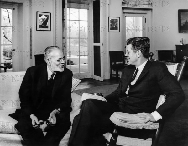 U.S. President John F. Kennedy (in rocking chair) meeting with President of the United Nations (UN) General Assembly, Muhammad Zafrulla Khan, Oval Office, White House, Washington, D.C., USA, Abbie Rowe, White House Photographs, November 21, 1962