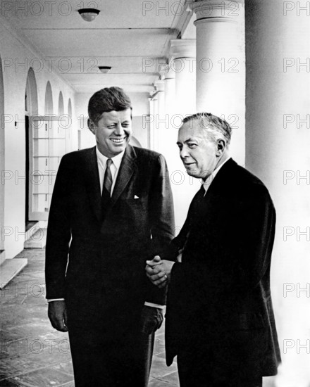 U.S. President John F. Kennedy meeting with Leader of the Labour Party of Great Britain, Harold Wilson (right), West Wing Colonnade, White House, Washington, D.C., USA, Abbie Rowe, White House Photographs, April 2, 1963