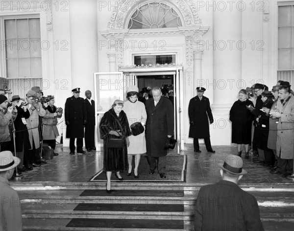 U.S. First Lady Mamie Eisenhower, Jacqueline Kennedy, and Senator Styles Bridges of New Hampshire depart White House for Inaugural Ceremonies, Washington, D.C., USA, Robert Knudsen, White House Photographs, January 20, 1961