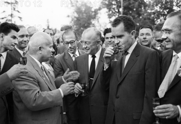 U.S. Vice President Richard M. Nixon enjoying a glass of American wine with Soviet Premier Nikita Khrushchev at the American Exhibition in Sokolniki Park, Moscow, Soviet Union, White House Photo Office, July 27, 1959