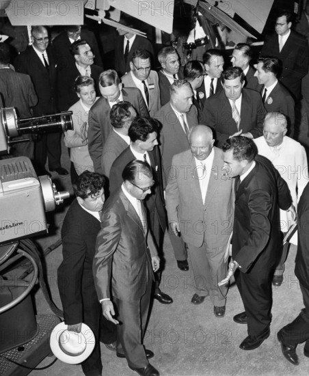 Soviet Premier Nikita Khrushchev and U.S. Vice President Richard M. Nixon pause in front of color television cameras to make a video tape recording before their tour of the American Exhibition at Sokolniki Park, Moscow, Soviet Union, White House Photo Office, July 27, 1959