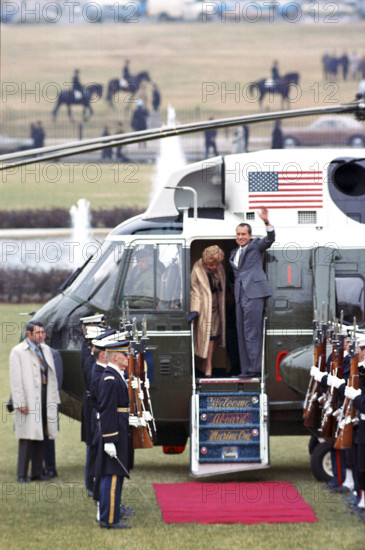 U.S. President Richard M. Nixon and U.S. First Lady Pat Nixon wave from helicopter door as they commence their trip to China, Washington, D.C., USA, White House Photo Office, February 17, 1972