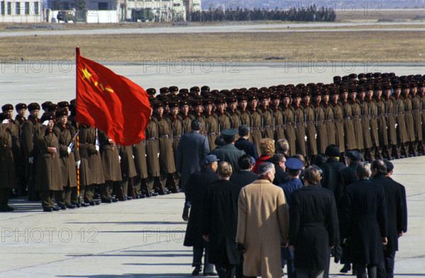 U.S. President Richard M. Nixon and Chinese Premier Chou En-Lai viewing Chinese Honor Guard during an arrival ceremony, Beijing, People's Republic of China, White House Photo Office, February 21, 1972