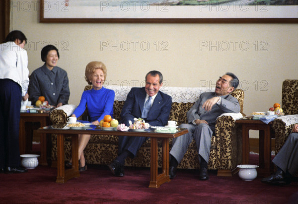U.S. President Richard M. Nixon and U.S. First Lady Pat Nixon have Tea and Laugh while seated with Chinese Premier Chou En-Lai, Beijing, China, White House Photo Office, February 21, 1972