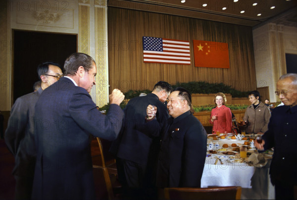 U.S. President Richard M. Nixon Sharing a Toast with a Chinese Official during a formal banquet in the Great Hall of the People, Beijing, China, White House Photo Office, February 21, 1972