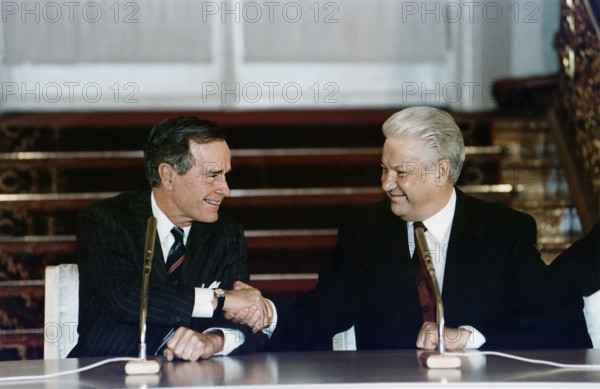U.S. President George H.W. Bush and Russian President Boris Yeltsin signing Start II Treaty at a Ceremony in Vladimir Hall, Kremlin, Moscow, Russia, Susan Biddle, White House photographer, January 3, 1993