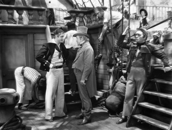 Robert Donat (left), Walter Walker (top hat), on-set of the film, "The Count Of Monte Cristo", United Artists, 1934