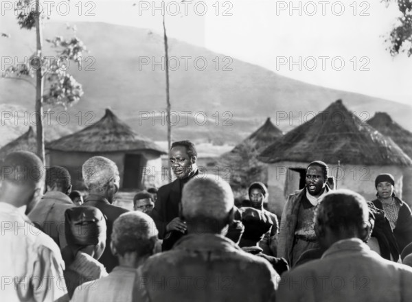 Canada Lee (center, facing camera), on-set of the film, "Cry, The Beloved Country", United Artists, 1951
