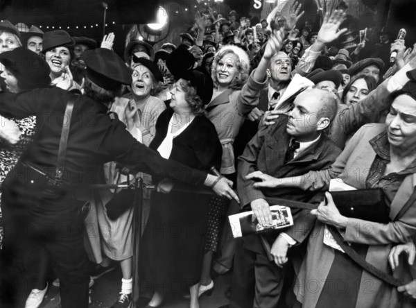 Karen Black (white hat), on-set of the film, "The Day Of The Locust", Paramount Pictures, 1975