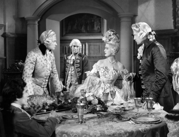 George Macready, Anita Louise, John Loder, on-set of the film, "The Fighting Guardsman", Columbia Pictures, 1945